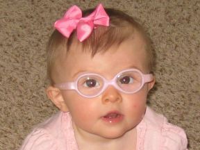 picture of a baby girl in glasses